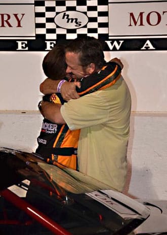 Kate and Wally share a victory hug.